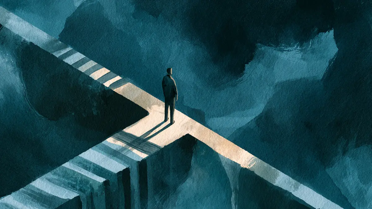 A person stands at a crossroads with two paths, one leading to steps down, against a dark.